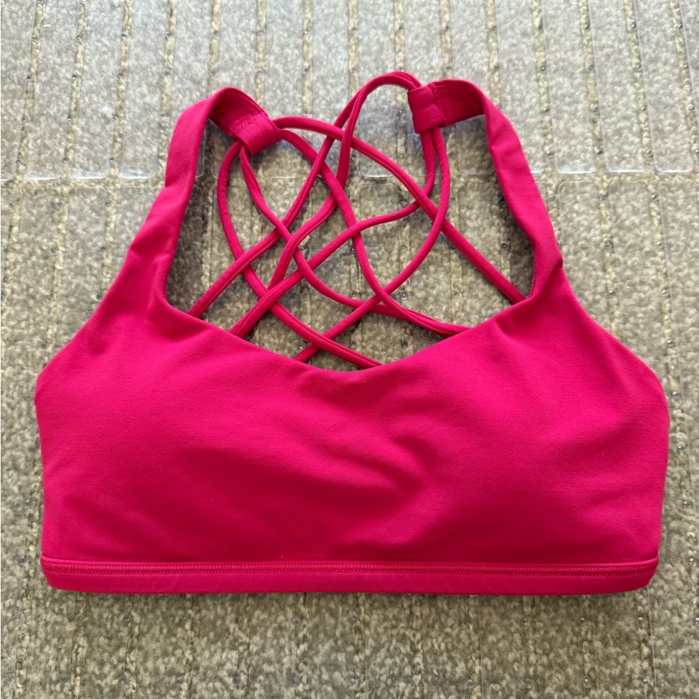 Hot pink Lululemon sports bra